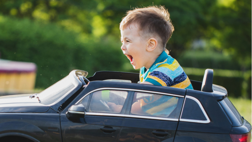 Kids sit in 2025 remote control car